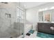 Elegant bathroom with white marble tile shower and separate tub plus double sink vanity at 245 Fairview Cir, Roswell, GA 30076