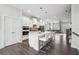 Modern, open-concept kitchen with island and stainless appliances at 245 Fairview Cir, Roswell, GA 30076