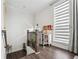 Bright foyer with a staircase and large window with modern shade at 245 Fairview Cir, Roswell, GA 30076
