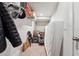 A storage room with shelving, a carpeted floor, and personal items is perfect for organization at 245 Fairview Cir, Roswell, GA 30076
