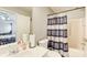 Bathroom featuring a shower and tub, single sink vanity and mirror at 2758 Snapfinger Mnr, Decatur, GA 30035