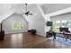 Spacious bonus room boasts vaulted ceilings, natural light, and hardwood floors, perfect for entertaining at 120 Farm Gate Dr, Woodstock, GA 30188
