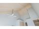Upward shot in the bedroom to show the wood ceiling with white ceiling fan at 2109 Defoors Ferry Nw Rd # D, Atlanta, GA 30318