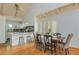 Dining area adjacent to the kitchen, features hardwood floors, vaulted ceilings, and natural light at 2109 Defoors Ferry Nw Rd # D, Atlanta, GA 30318