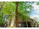 Exterior view of home with private stairs and balconies at 2109 Defoors Ferry Nw Rd # D, Atlanta, GA 30318
