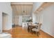 Bright open living room, dining, and kitchen area with hardwood floors at 2109 Defoors Ferry Nw Rd # D, Atlanta, GA 30318