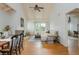 Bright living room with hardwood floors, fireplace, ceiling fan and a door that leads to the outside at 2109 Defoors Ferry Nw Rd # D, Atlanta, GA 30318