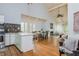 Open-concept living space with a kitchen, dining area, and living room, perfect for entertaining and Gathering gatherings at 2109 Defoors Ferry Nw Rd # D, Atlanta, GA 30318