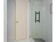 Modern bathroom shower featuring sleek glass doors and black hardware at 2109 Defoors Ferry Nw Rd # D, Atlanta, GA 30318