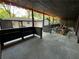 Spacious back porch prepped for transformation into an outdoor living space with elegant string lights at 3572 Adkins Nw Rd, Atlanta, GA 30331