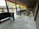 Expansive back porch shows space and design, enhanced with decorative string lights at 3572 Adkins Nw Rd, Atlanta, GA 30331