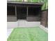 Cozy backyard featuring a wooden deck and a patch of artificial grass at 3572 Adkins Nw Rd, Atlanta, GA 30331