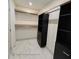 Organized closet features sleek black cabinetry and shelving for efficient storage solutions at 3572 Adkins Nw Rd, Atlanta, GA 30331