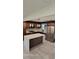 Modern kitchen with stainless steel appliances, herringbone backsplash and beautiful island at 3572 Adkins Nw Rd, Atlanta, GA 30331