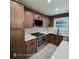 Kitchen featuring stainless steel appliances, sleek cabinetry and stone countertops at 3572 Adkins Nw Rd, Atlanta, GA 30331