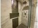 Luxurious tiled shower with a rainfall showerhead and a built-in niche at 3572 Adkins Nw Rd, Atlanta, GA 30331