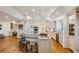 Spacious kitchen with a unique island, stainless steel appliances, and ample counter space for culinary enthusiasts at 5251 Powers Ferry Rd, Atlanta, GA 30327