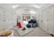 Spacious playroom features vaulted ceilings, skylights, and built-in storage at 5251 Powers Ferry Rd, Atlanta, GA 30327