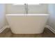 Bathroom featuring a stand alone tub at 678 Egrets Landing #63, Covington, GA 30014