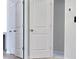 Bedroom door with a two-panel design and satin nickel hardware at 678 Egrets Landing #63, Covington, GA 30014