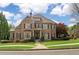 Beautiful brick home with manicured lawn and mature trees in a desirable neighborhood at 2114 Castlewycke Ct, Marietta, GA 30068