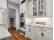 Modern kitchen with stainless steel appliances and custom cabinets at 2114 Castlewycke Ct, Marietta, GA 30068