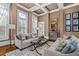 Bright living room with neutral tones, hardwood floors, and stylish furnishings at 2114 Castlewycke Ct, Marietta, GA 30068