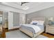 This is a main bedroom with hardwood floors and an ensuite bath at 2114 Castlewycke Ct, Marietta, GA 30068