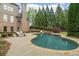 The large in-ground pool offers a spa feature and plenty of space to relax and unwind at 2114 Castlewycke Ct, Marietta, GA 30068