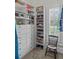 Organized walk-in closet with custom shelving for shoes, drawers, and ample storage at 2114 Castlewycke Ct, Marietta, GA 30068