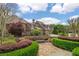 Well-maintained yard with mature trees and colorful landscaping in a desirable neighborhood at 2114 Castlewycke Ct, Marietta, GA 30068