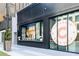 Exterior view of a modern bake shop with large display windows and patio at 244 13Th Ne St # 310, Atlanta, GA 30309