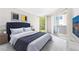 Comfortable bedroom with large bed and access to balcony at 244 13Th Ne St # 310, Atlanta, GA 30309