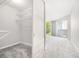 Bright bedroom featuring a mirrored closet and balcony access with lots of natural light at 244 13Th Ne St # 310, Atlanta, GA 30309