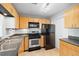 Functional kitchen with modern appliances and ample cabinet space at 244 13Th Ne St # 310, Atlanta, GA 30309