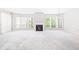 Bright open living room with fireplace and lots of natural light at 244 13Th Ne St # 310, Atlanta, GA 30309