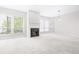 Bright living room featuring a fireplace and natural lighting at 244 13Th Ne St # 310, Atlanta, GA 30309
