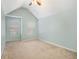 Bright bedroom with neutral carpet, two windows, and a ceiling fan at 4312 Defoors Farm Trl, Powder Springs, GA 30127