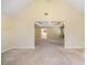 A large neutral colored bedroom featuring an open doorway at 4312 Defoors Farm Trl, Powder Springs, GA 30127