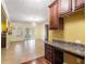 Bright dining room with chandelier, open to the kitchen, and leading to a patio at 4312 Defoors Farm Trl, Powder Springs, GA 30127