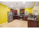 Gourmet kitchen featuring stainless steel appliances, granite countertops, and ample cabinet space for storage at 4312 Defoors Farm Trl, Powder Springs, GA 30127