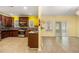 Modern kitchen equipped with stainless steel appliances, dark wood cabinets, and a cozy breakfast bar at 4312 Defoors Farm Trl, Powder Springs, GA 30127