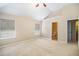 Spacious main bedroom with vaulted ceilings and ensuite bathroom access at 4312 Defoors Farm Trl, Powder Springs, GA 30127
