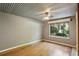 Bedroom with hardwood floors, natural light from the window and unique ceiling at 702 Argonne Ne Ave # 1, Atlanta, GA 30308