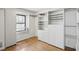 Walk-in closet features custom shelving and storage space; hardwood flooring; natural light at 702 Argonne Ne Ave # 1, Atlanta, GA 30308