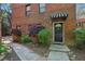 Charming brick home with a landscaped front yard and a welcoming front door at 702 Argonne Ne Ave # 1, Atlanta, GA 30308