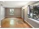 Bright living room featuring hardwood floors, large windows, and neutral color at 702 Argonne Ne Ave # 1, Atlanta, GA 30308
