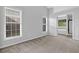 Spacious bedroom with large windows and neutral tones at 1112 Autumn Glen Way, Dacula, GA 30019