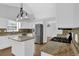 Kitchen showcasing granite countertops, stainless steel appliances, and tiled backsplash at 1112 Autumn Glen Way, Dacula, GA 30019