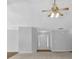 Bright living room with carpet, a ceiling fan, and an open layout for comfortable living at 1112 Autumn Glen Way, Dacula, GA 30019